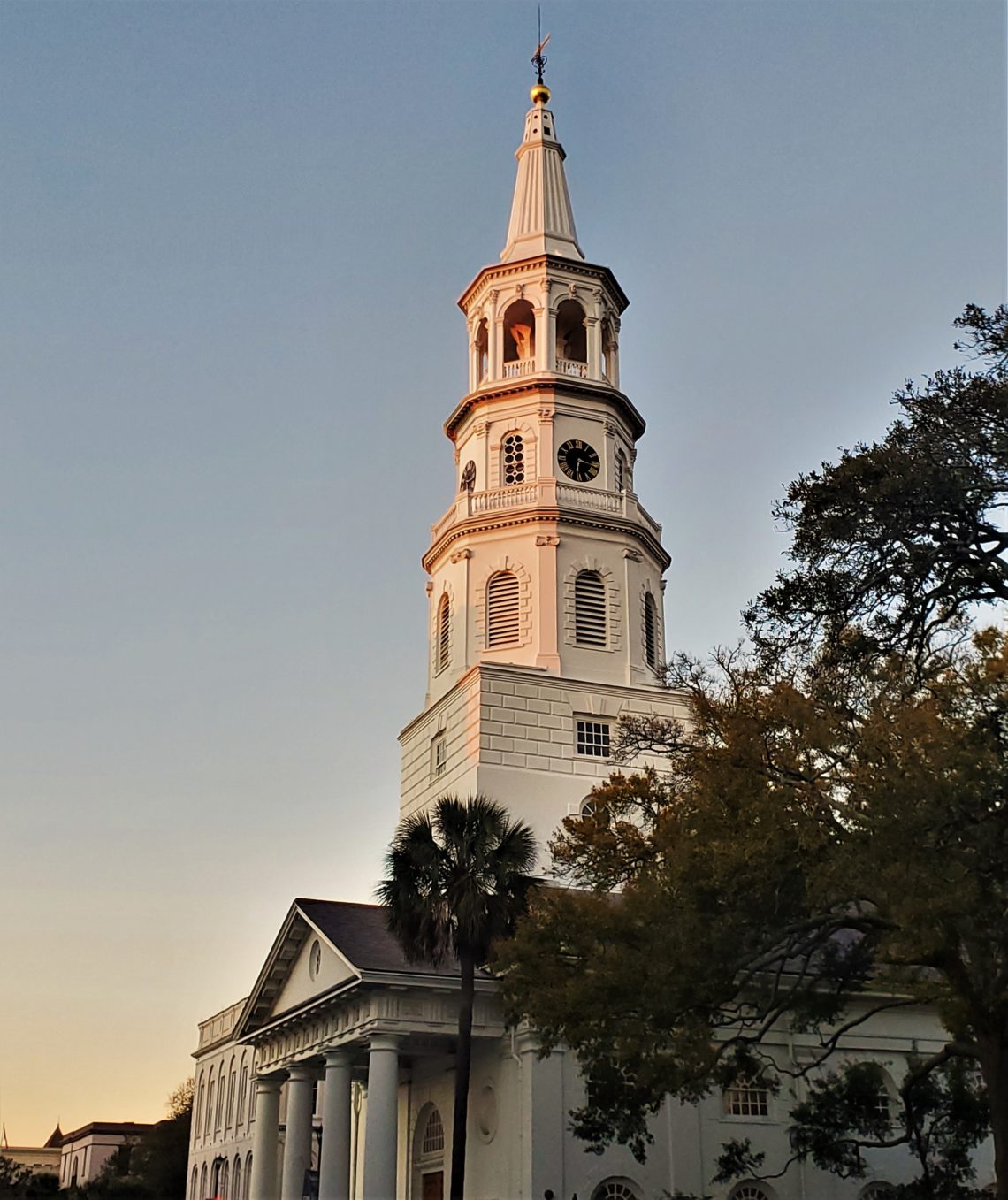 St. Michael's steeple being bathed in the light of the setting sun. The iconic white steeple wasn't always that way. During the Revolutionary and Civil Wars it was painted black, to make it a tougher target during the bombardment of the city.