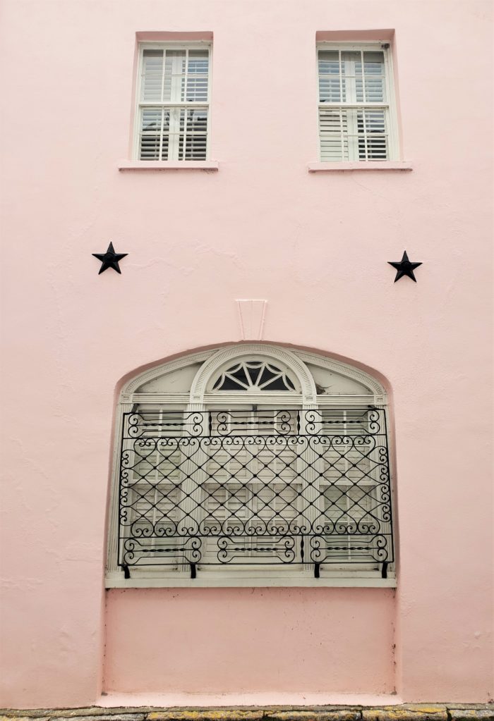 The side of this building in St. Michael's Alley has always reminded me of a face with dimples. The "dimples" are not, however, purely decorative. They are the end of earthquake bolts (or rods), which were used to strengthen the structural integrity of the building.