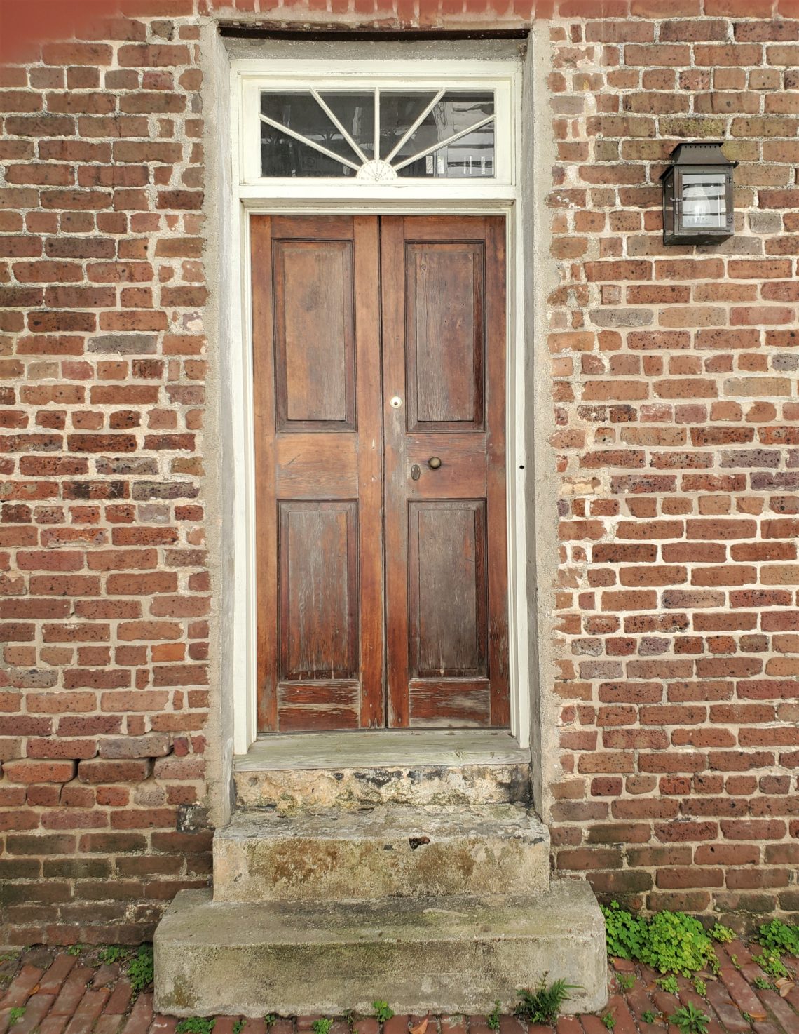 This cool door can be found on Stolls Alley -- which was once referred to as Pilot's Alley, as the ship pilots would cut through there from Church Street to get to the harbor wharves.