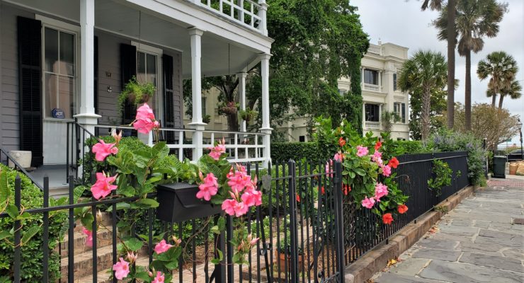 This classic Charleston scene on Atlantic Street is in front of a house that was built in 1890 -- one of two identical ones that replaced a larger house that had been destroyed in an earthquake.